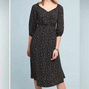 Black off the shoulder dress with yellow flowers